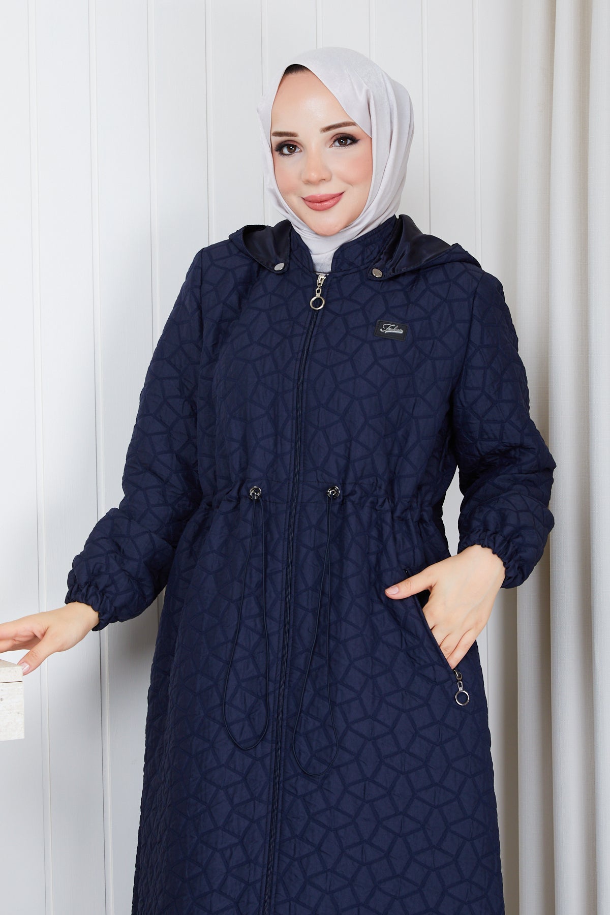 BELİ BÜZGÜLÜ KAPİTONE MONT